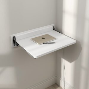 FlexDesk foldable wall-mounted desk unfolded as a compact floating workstation in a small home office