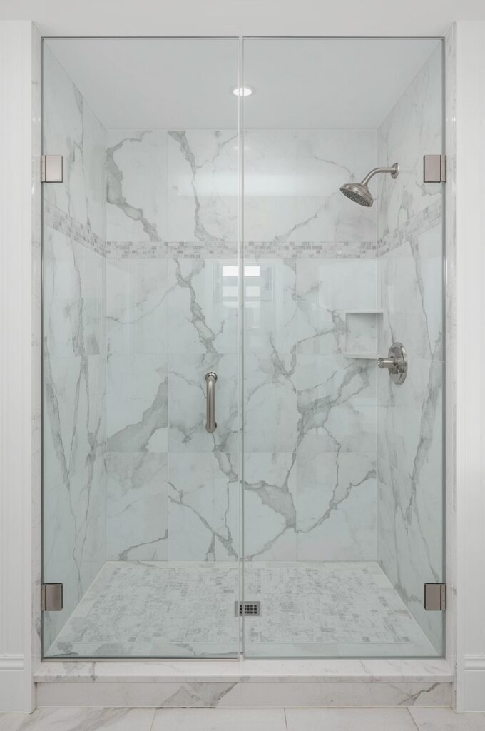Frameless Shower with Marble Tiles