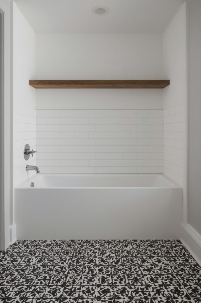 Tub with Bold Patterned Floor Tiles